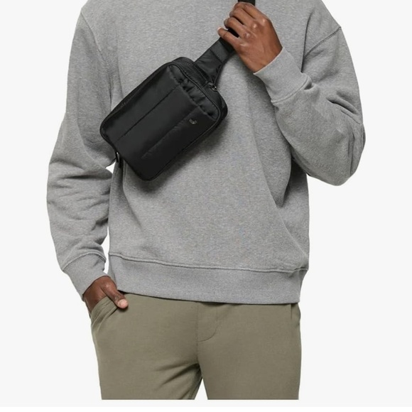 Lole Handbags - Lole Black quilted Crossbody Bag with hand warmer compartment